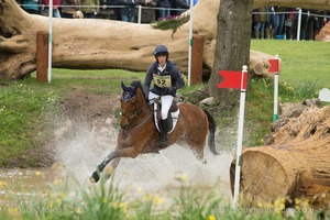 Tom McEwen riding Toledo De Kerser at the Hildon Water Pond - Badminton Horse Trials 2017