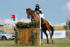 India Wishart riding THE MASTERS HARRY at the Dodson &amp; Horrell Staypower (12A/B/C) - Gatcombe Festival of Eventing 2015