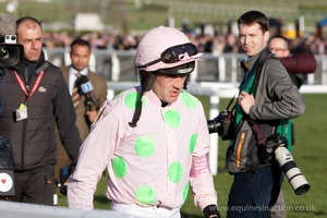 Ruby Walsh walks back after his final flight fall from Annie Power in the OLBG Mare's Hurdle.