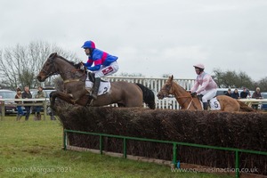 Eventual winner Buck Magic and Kiteney Wood  in the Hunt Members Race